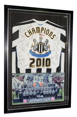 Lot 608 - A Newcastle United "Champions 2010" signed football shirt.