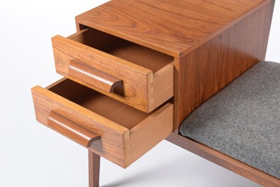 Lot 635 - Chippy Heath Furniture: a mid Century teak telephone table.