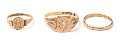 Lot 118 - Two 9ct gold signet rings, and an 18ct gold wedding band.