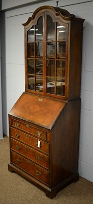 Lot 58 - A 20th Century Queen Anne style walnut bureau bookcase