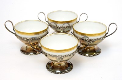 Lot 167 - Shreve & Co and Limoges bowls in silver stands