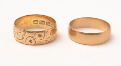 Lot 111 - Two 18ct gold wedding bands.
