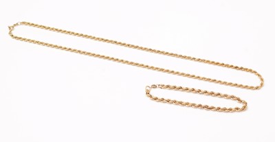 Lot 133 - A 9ct gold rope-link necklace and bracelet.