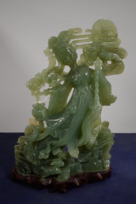 Lot 371 - A Chinese carved jade figure