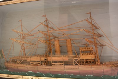 Lot 979 - A 19th Century straw work model of a three-masted steamer.