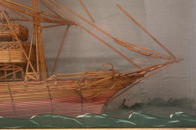 Lot 979 - A 19th Century straw work model of a three-masted steamer.