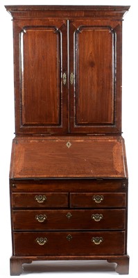 Lot 635 - A George III mahogany and banded bureau...