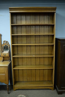 Lot 68 - A light oak open bookcase