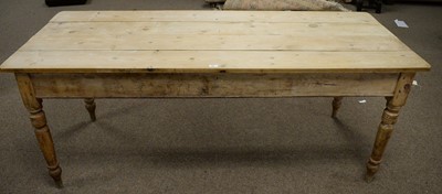 Lot 82 - A late 19th/early 20th Century rustic stripped pine plank-top kitchen table