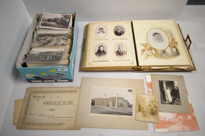 Lot 456 - A Victorian photograph album, and a collection of postcards.