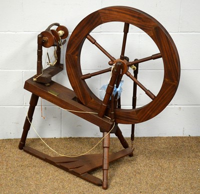 Lot 27 - 20th C mahogany spinning wheel.
