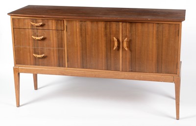 Lot 629 - 1950's walnut sideboard; and matching dining table.