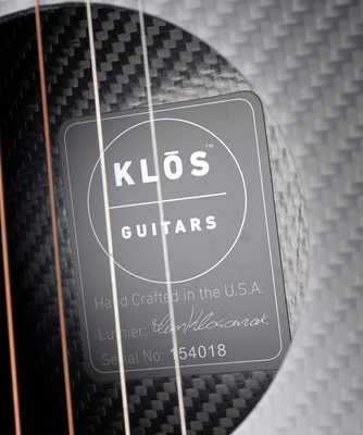 Lot 847 - Klos mini travel guitar