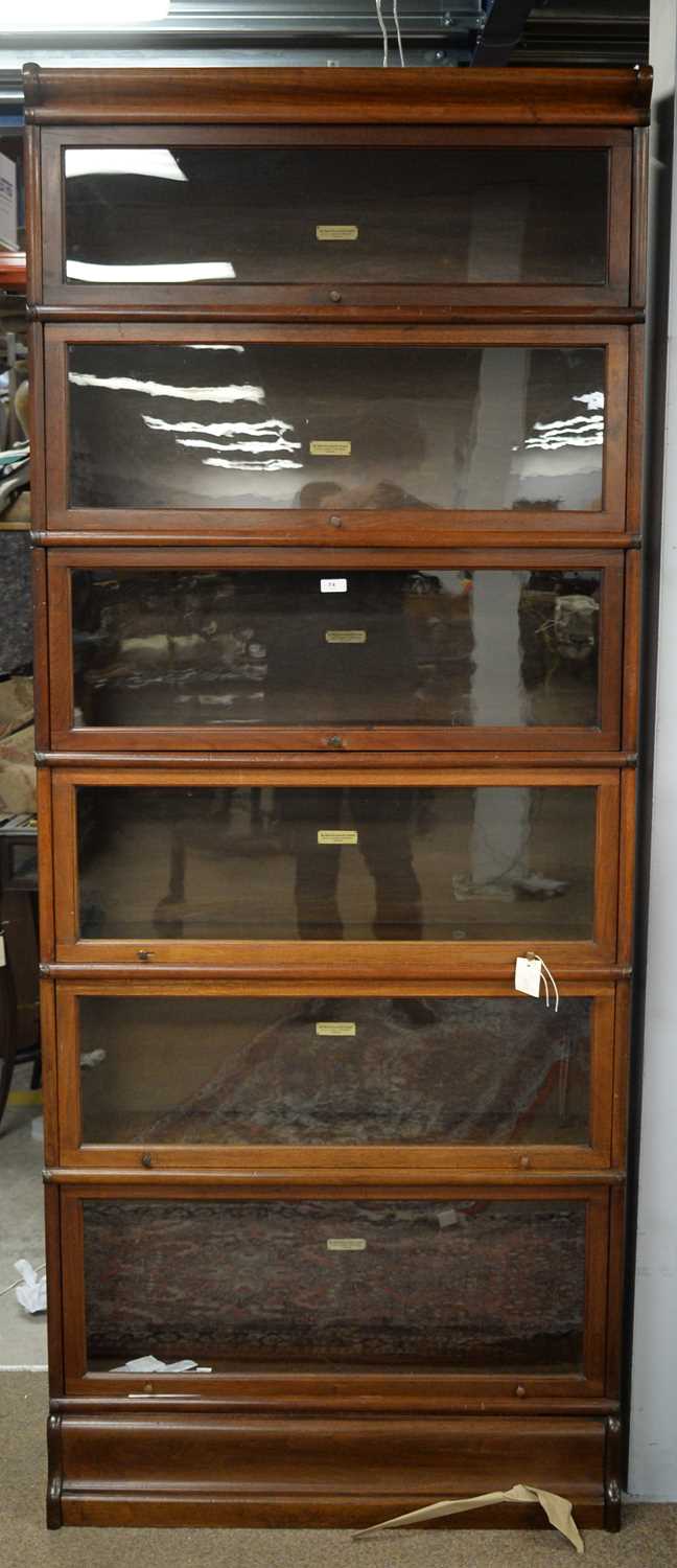 Lot 74 - Globe-Wernicke Co.Limited six-tier mahogany stacking bookcase.
