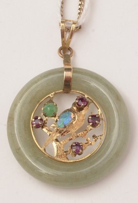 Lot 50 - A jade coloured stone and gemstone pendant
