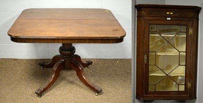 Lot 64 - A Georgian style mahogany corner cupboard and a Victorian mahogany breakfast table
