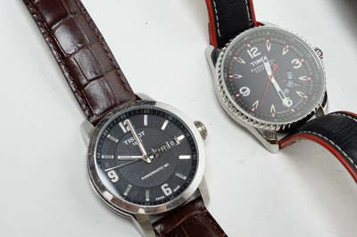 Lot 219 - Two contemporary wristwatches by Tissot and Timex