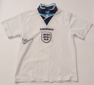 Lot 649 - A Peter Beardsley autograph football shirt