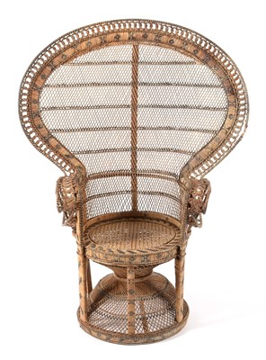 Lot 637 - An Emmanuelle wicker peacock chair, 1970's
