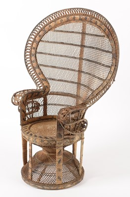 Lot 637 - An Emmanuelle wicker peacock chair, 1970's