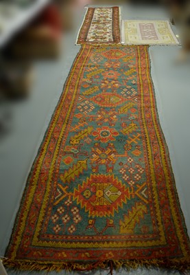Lot 150 - A modern Persian style rug; a modern Persian runner; and a Caucasian runner.