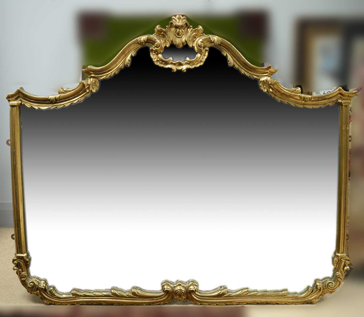 Lot 257 - An ornate gold painted mirror