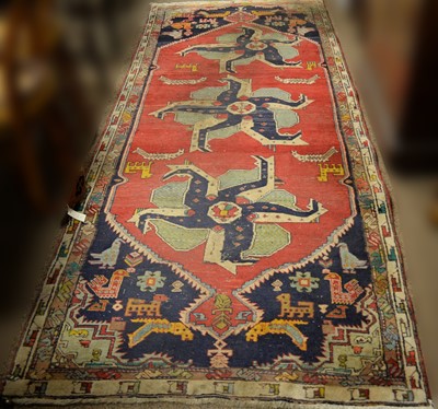 Lot 147 - An unusual North West Persian rug