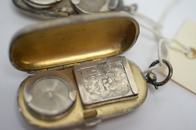 Lot 177 - Two early 20th Century silver sovereign cases
