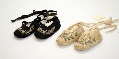 Lot 754 - Two pairs of early Victorian florally embroidered silk baby slippers.