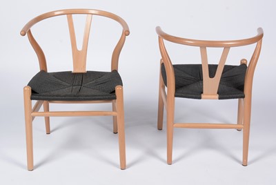 Lot 641 - Six modern CH25 style beech and black cord wishbone chairs .