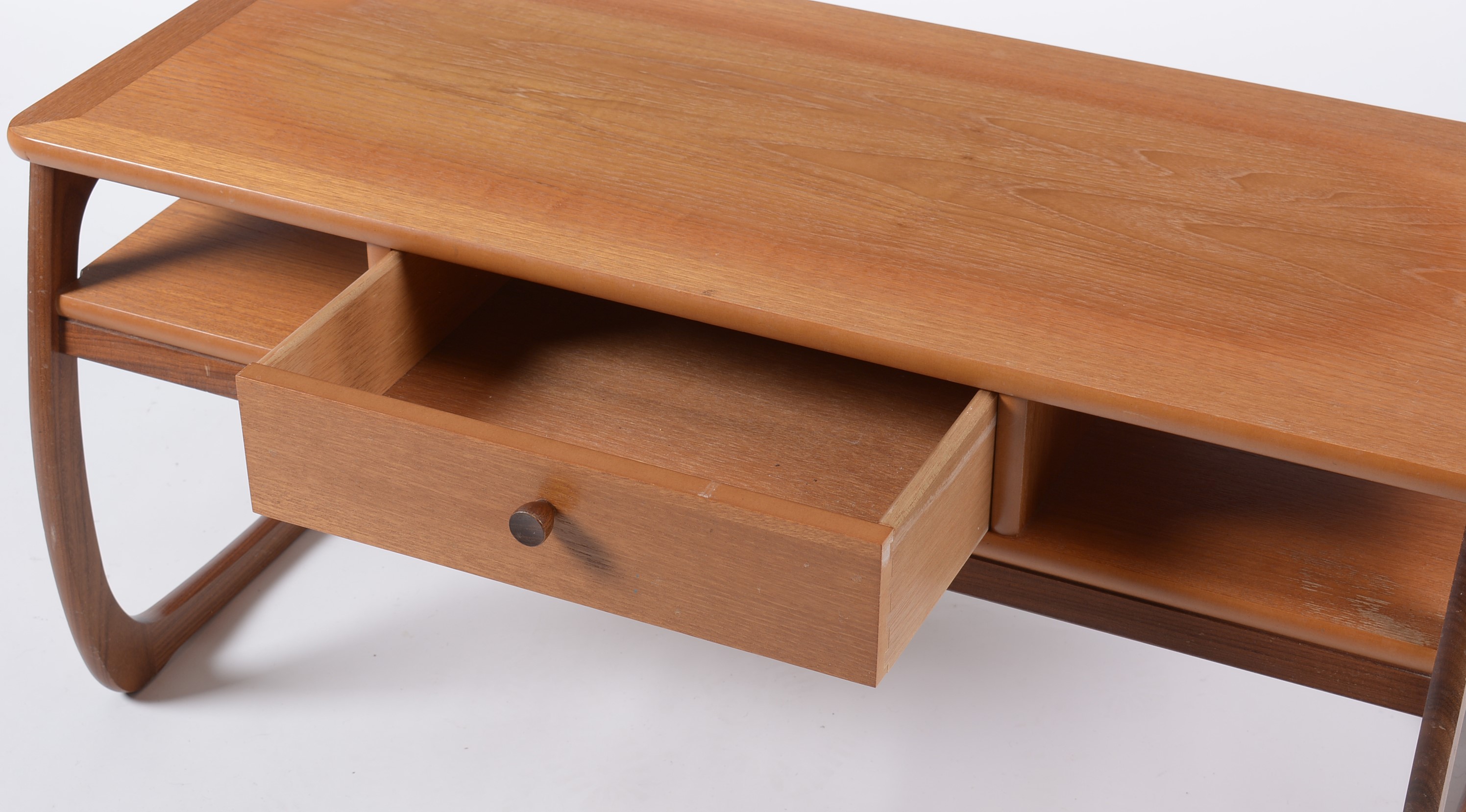 Lot 647 Parker Knoll a teak coffee table.