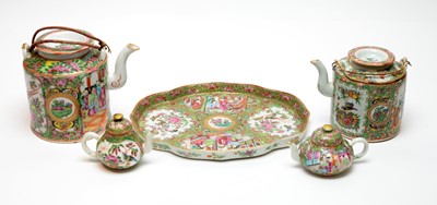 Lot 441 - Two small Cantonese teapots, a tray and two tea kettles