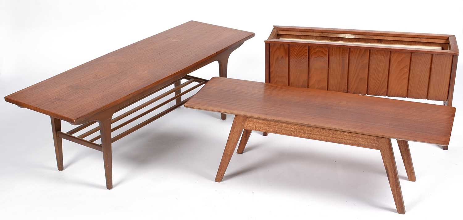 Lot 663 - Two mid Century teak coffee tables; and a planter.