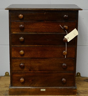 Lot 19 - An early 20th C miniature chest of six drawers.