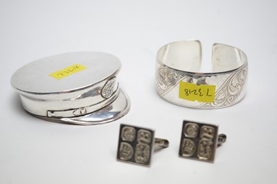 Lot 169 - A Second World War RAF novelty compact, a bangle, and a pair of silver cufflinks.