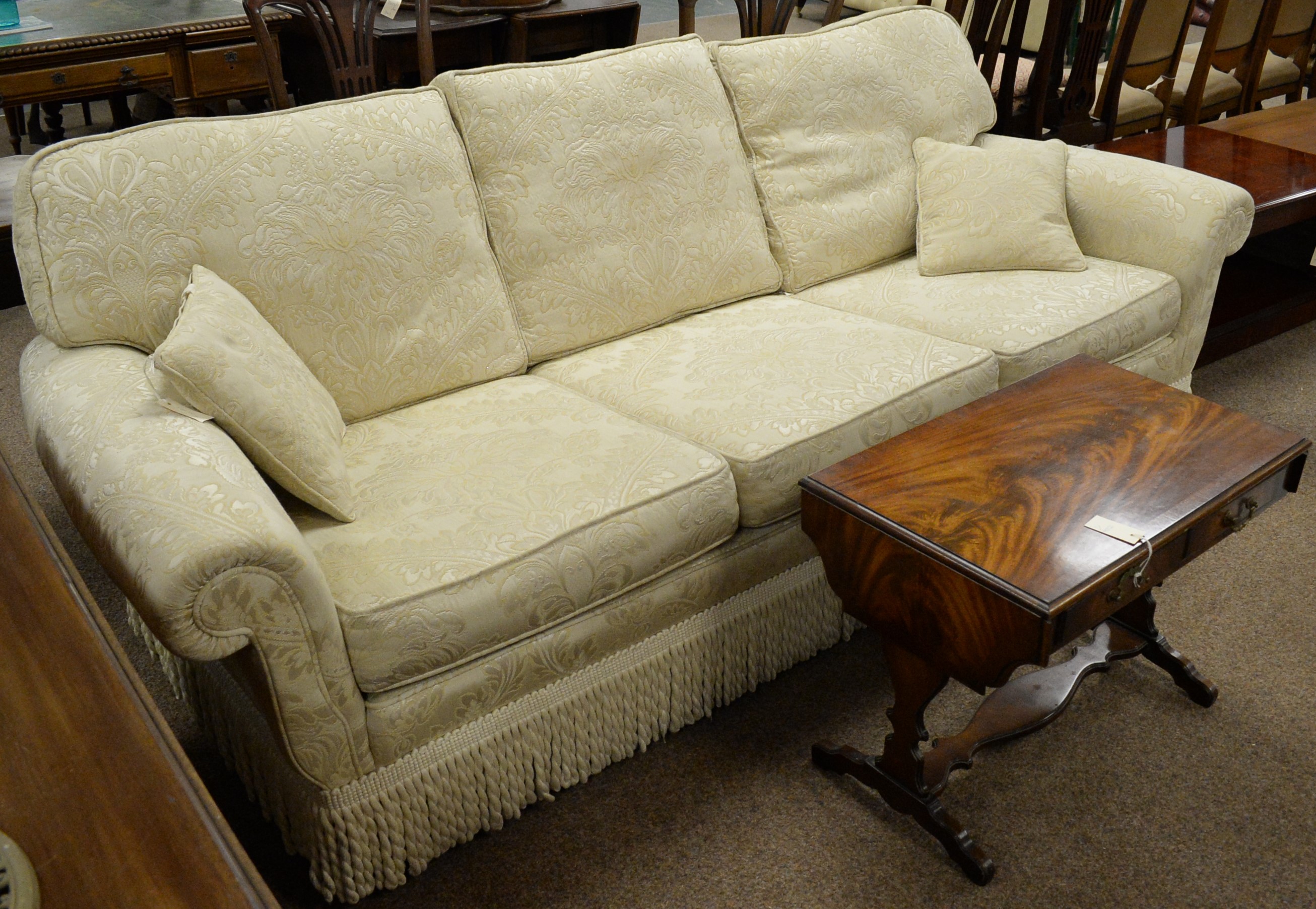 Lot 32 Peter Guild threeseater sofa.