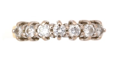Lot 95 - A seven stone diamond ring