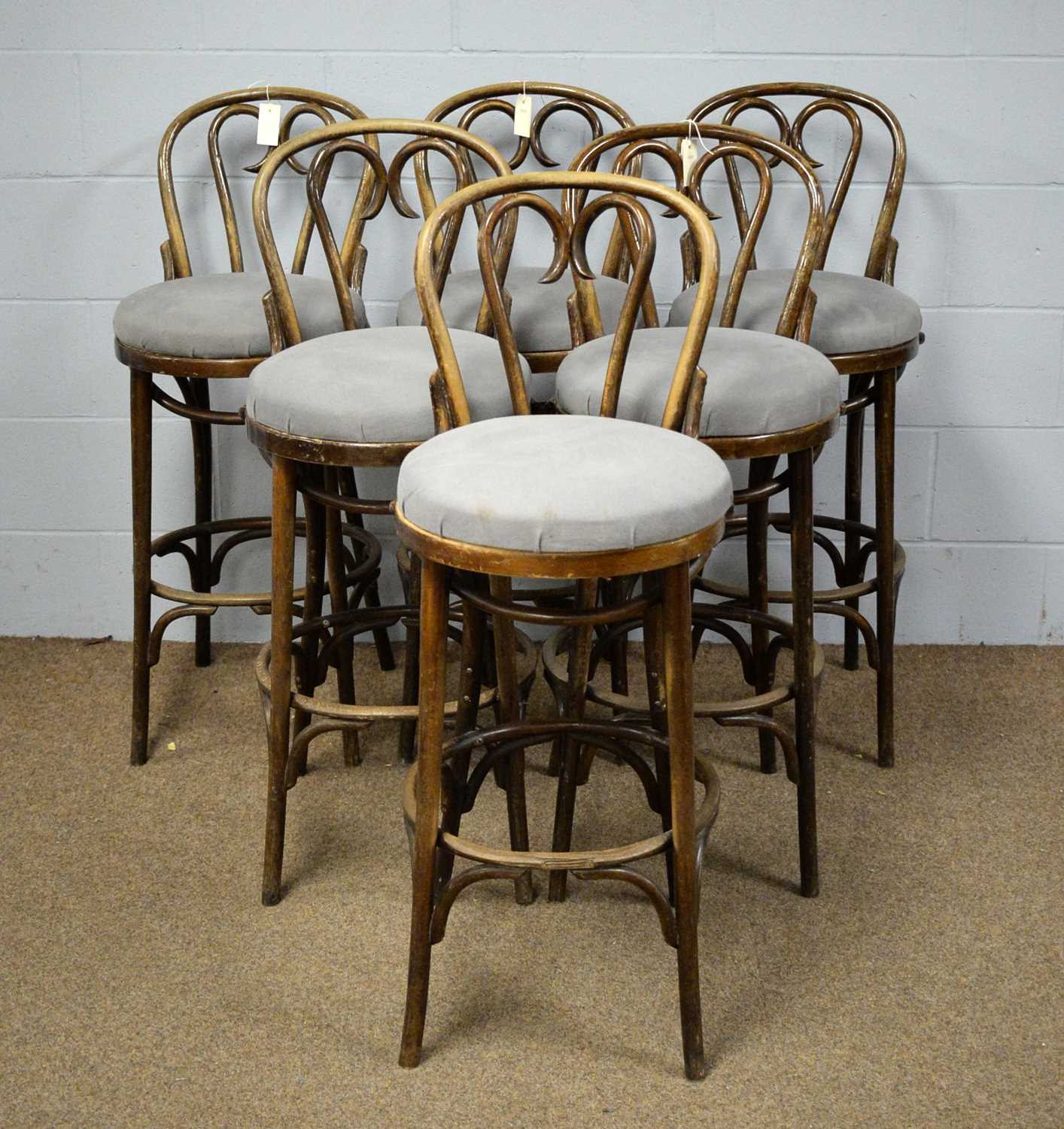 Lot 61 - A set of six vintage bent beechwood bar stools