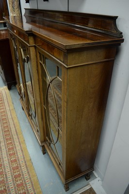Lot 98 - Early 20th C low breakfront bookcase.