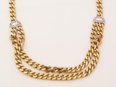 Lot 99 - An 18ct yellow gold and diamond necklace.