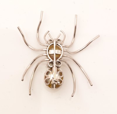 Lot 110 - Diamond, baroque pearl and white metal spider brooch