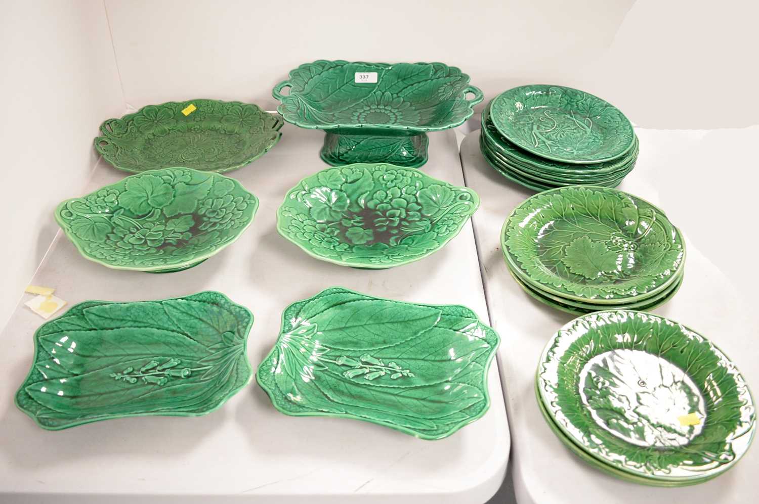 Lot 337 - A selection of green Majolica ceramics.