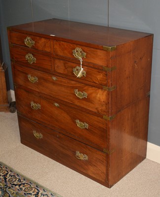 Lot 651 - A 19th Century Irish mahogany campaign chest by Ross & Co, Dublin.