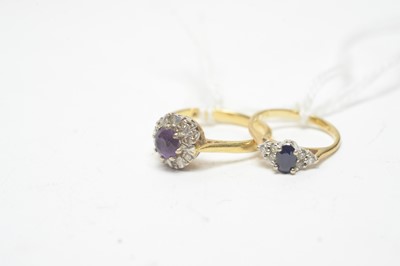 Lot 237 - A sapphire and diamond ring, and a amethyst and diamond ring