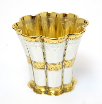 Lot 173 - A set of four silver gilt and enamel cups