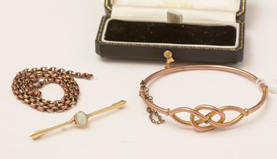 Lot 113 - An antique opal bar brooch and a hinged bangle