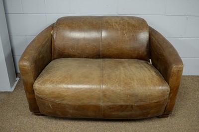 Lot 53 - A modern brown two-seater love seat.