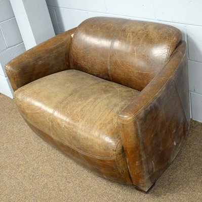Lot 53 - A modern brown two-seater love seat.