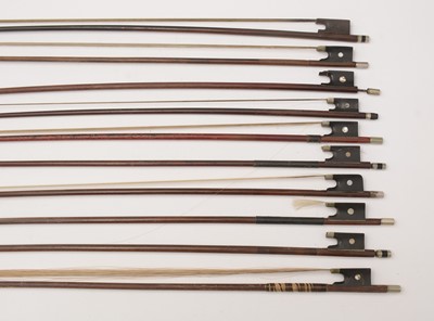 Lot 831 - A bundle of ten violin bows