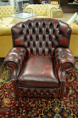 Lot 51 - A Chesterfield style oxblood three-piece suite